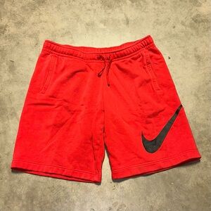 Nike Men's Athletic Red Shorts with Black Swoosh